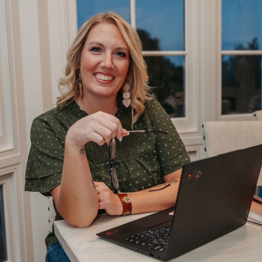 Ashley working alongside a team